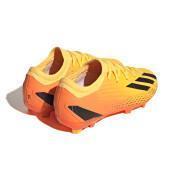 Botas de fútbol para niños adidas X Speedportal.3 FG Heatspawn Pack